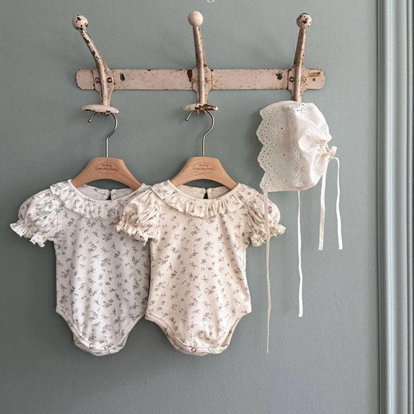 Ann Ruffle Bodysuit Korean infant bodysuit in ivory made in Korea