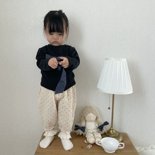 Pantalones con volantes de lunares