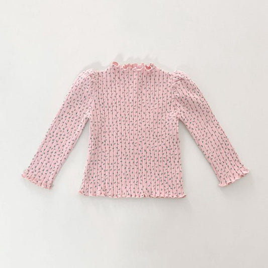 Camiseta floral con volantes de color rosa melocotón