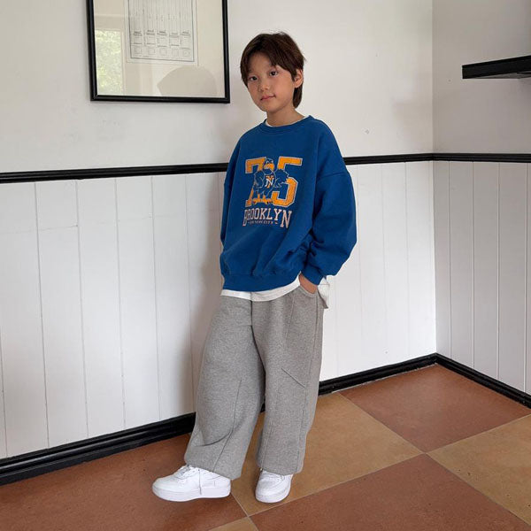 Pantalones deportivos con paneles anchos