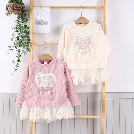 Vestido de encaje con espalda de corazón