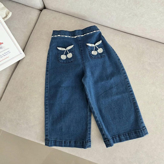 Vaqueros elásticos con bolsillo de cereza