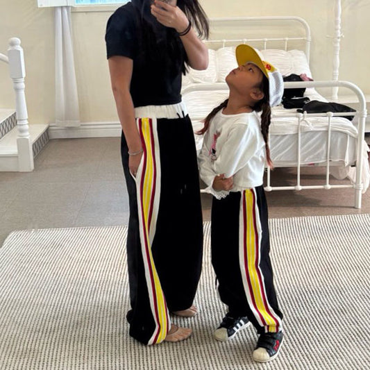 Joggers de rayas rojas y amarillas (adulto)