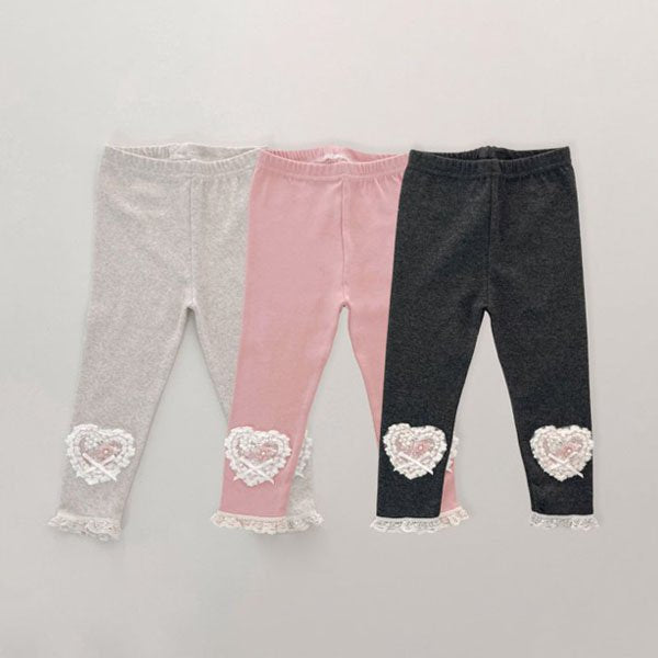 Leggings con lazo de corazón rosa