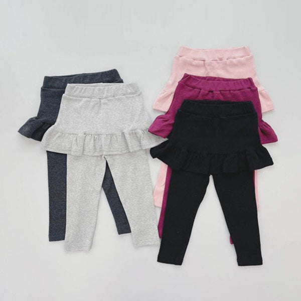 Leggings con falda escalonada con volantes